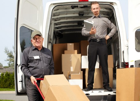 Business relocation checklist and boxed office items ready for collection