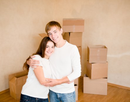 Packed moving boxes and furniture ready for a house removal