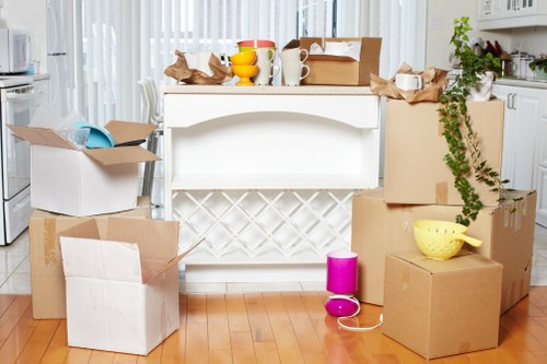 Workers using careful lifting techniques during a move